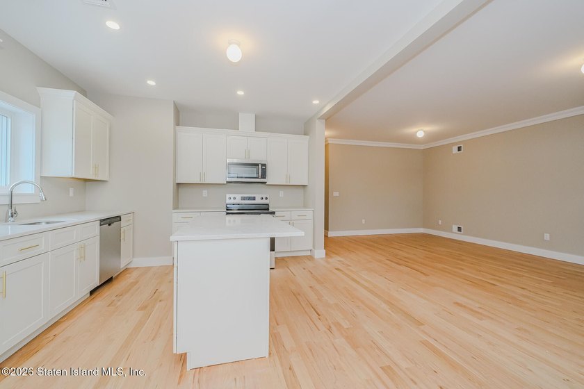 NEW CONSTRUCTION! Beautiful oversized TWO family 6/6 built with - photo 11