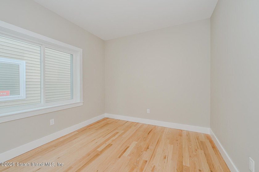 NEW CONSTRUCTION! Beautiful oversized TWO family 6/6 built with - photo 14