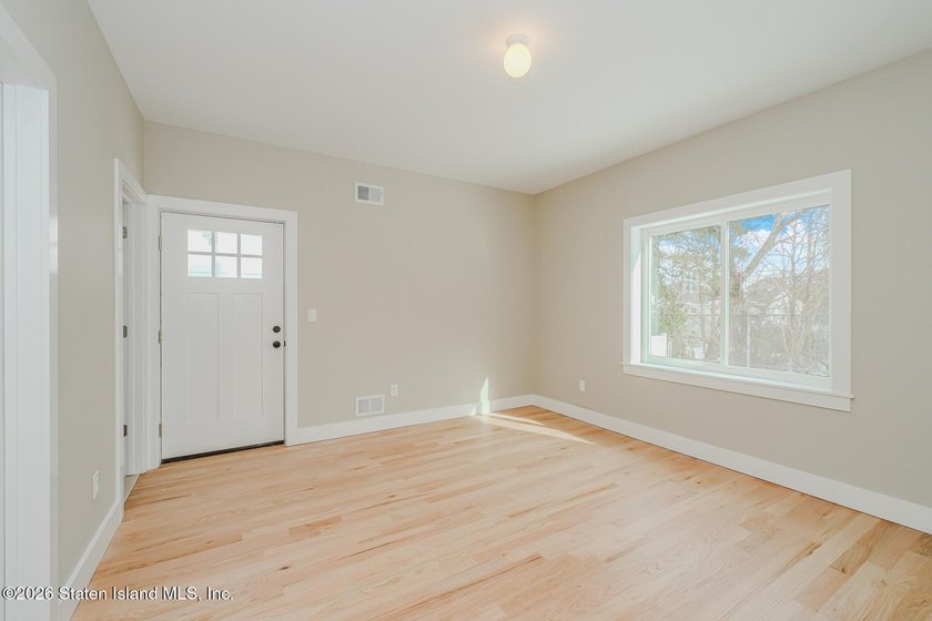 NEW CONSTRUCTION! Beautiful oversized TWO family 6/6 built with - photo 17