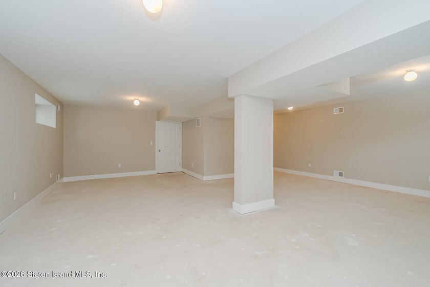 NEW CONSTRUCTION! Beautiful oversized TWO family 6/6 built with - photo 27
