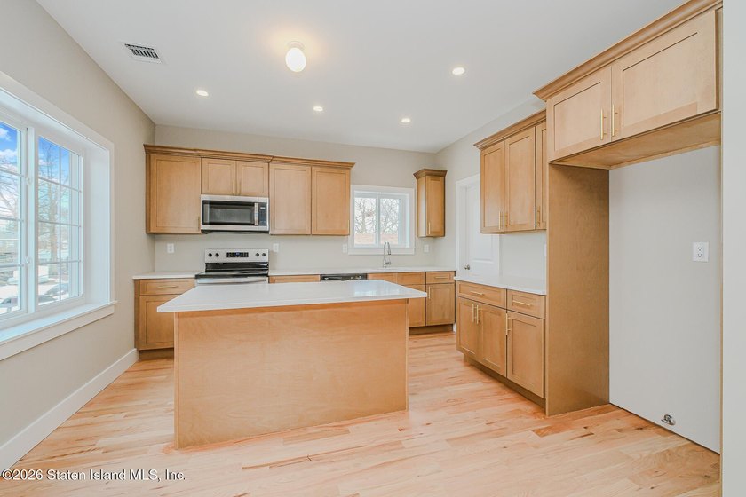 NEW CONSTRUCTION! Beautiful oversized TWO family 6/6 built with - photo 41
