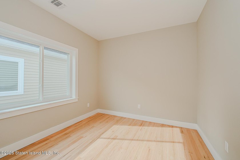 NEW CONSTRUCTION! Beautiful oversized TWO family 6/6 built with - photo 46