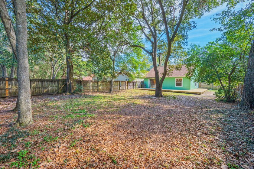 MAJOR PRICE REDUCTION! Backyard OASIS with new deck just - photo 22