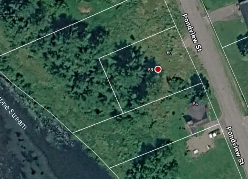 This .28 acres lot is located on a quiet side Street overlooking - photo 2