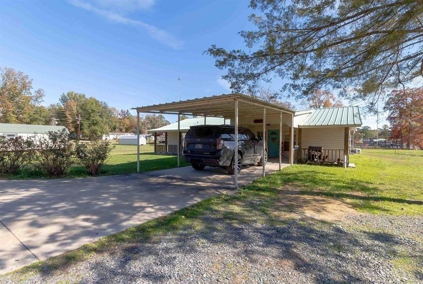 Updated home on North side of Lake Murvaul. This property is the - photo 2