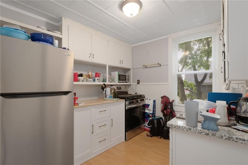 Excellent opportunity to own a well-maintained three-family - photo 15