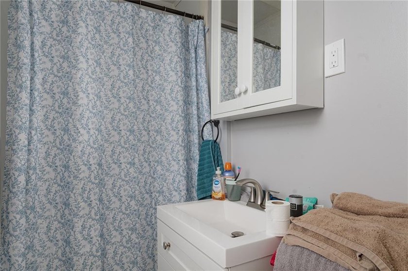 Excellent opportunity to own a well-maintained three-family - photo 27