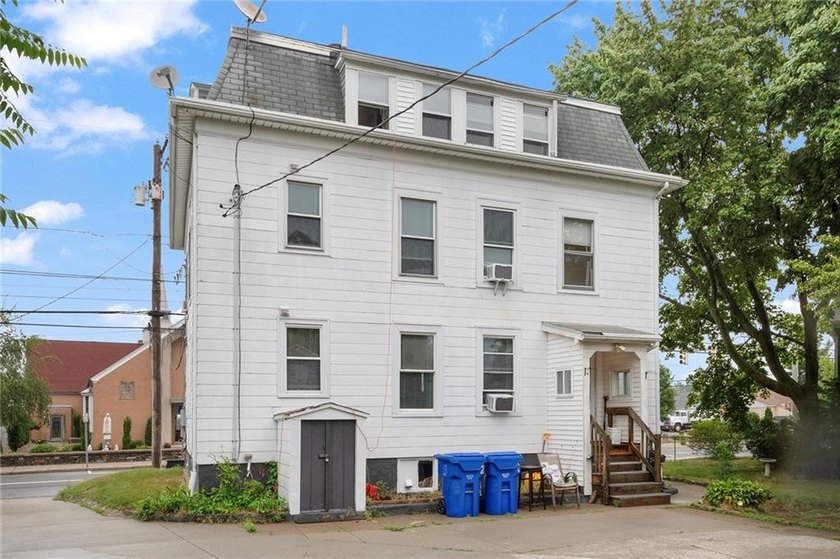 Excellent opportunity to own a well-maintained three-family - photo 31
