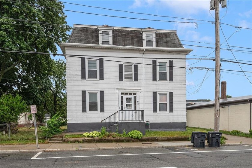 Excellent opportunity to own a well-maintained three-family - photo 32