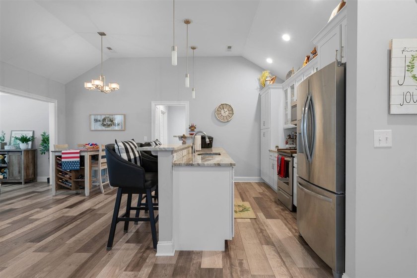 Convenience, low maintenance living, and an unbeatable in town - photo 6