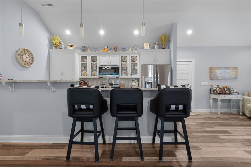 Convenience, low maintenance living, and an unbeatable in town - photo 9
