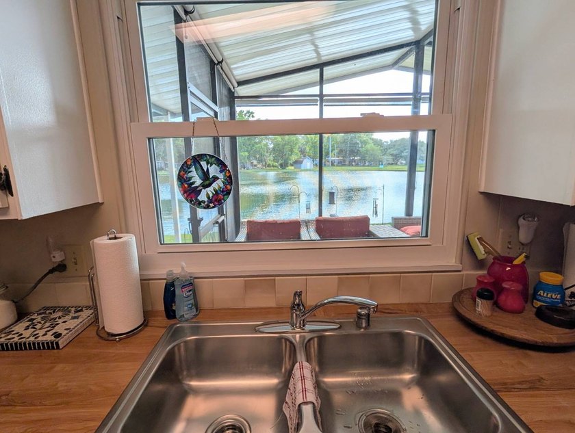 This stunning fully furnished lakefront home in the 55+ - photo 11