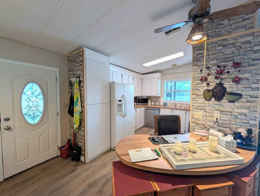 This stunning fully furnished lakefront home in the 55+ - photo 13