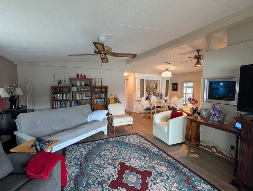 This stunning fully furnished lakefront home in the 55+ - photo 16