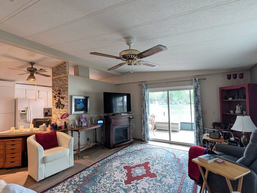 This stunning fully furnished lakefront home in the 55+ - photo 18