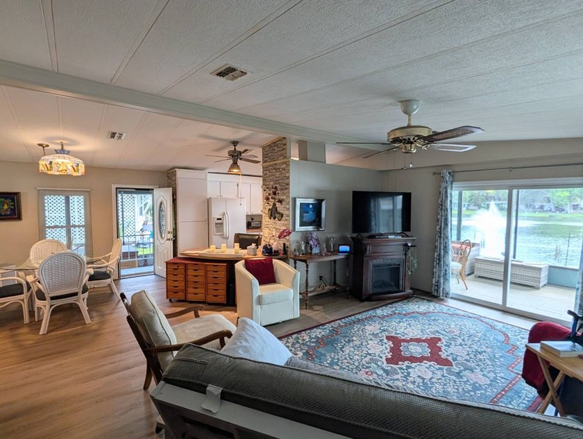 This stunning fully furnished lakefront home in the 55+ - photo 20