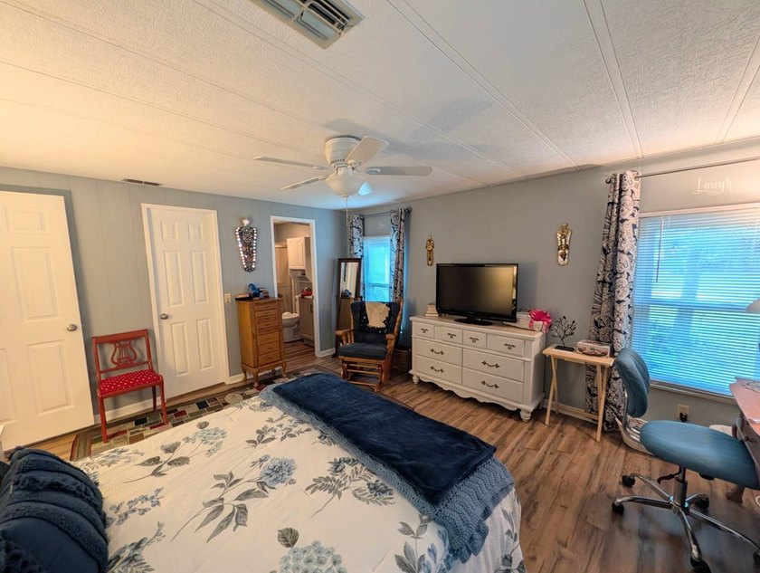 This stunning fully furnished lakefront home in the 55+ - photo 30