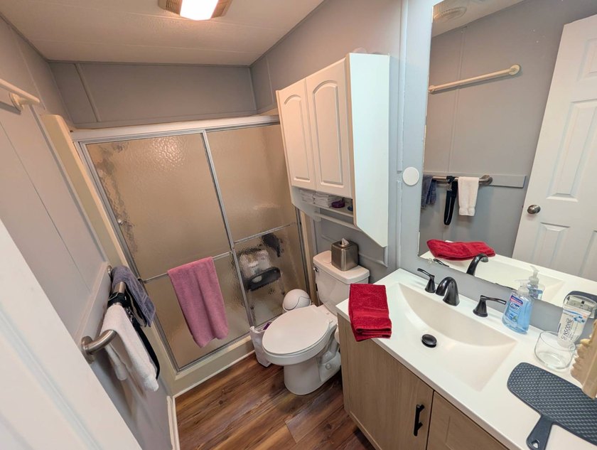 This stunning fully furnished lakefront home in the 55+ - photo 33