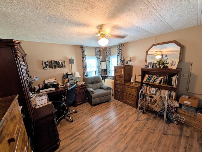 This stunning fully furnished lakefront home in the 55+ - photo 36