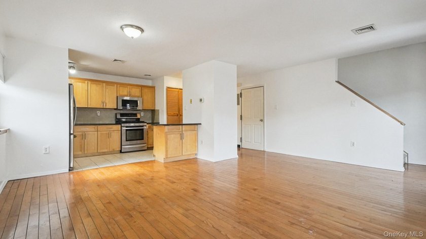Welcome to this 3-bedroom, 1.5-bath condominium in a gated - photo 8
