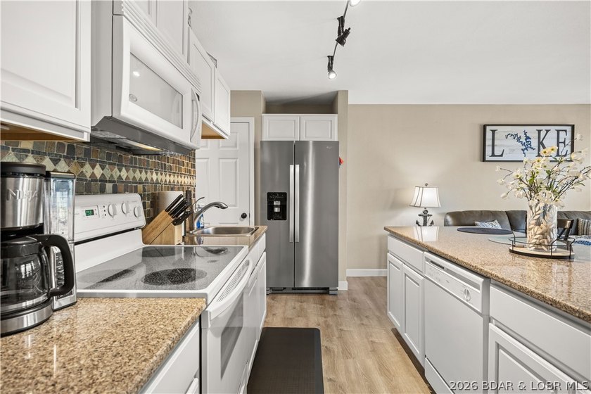 The perfect blend of luxury &amp; income potential in the heart of - photo 11