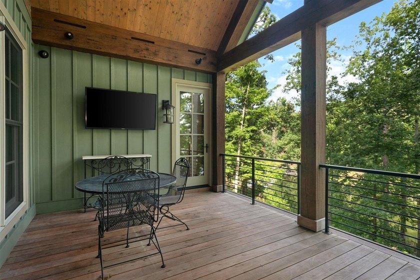 Experience lake living at its finest in this custom-built - photo 9