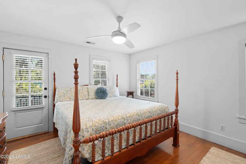 Anchored by a magnificent 400 year old live oak at the front of - photo 27