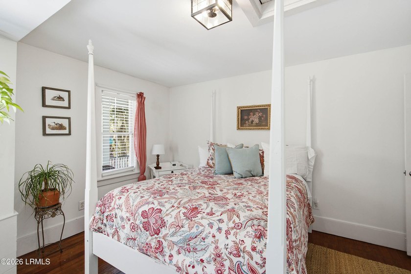 Anchored by a magnificent 400 year old live oak at the front of - photo 33
