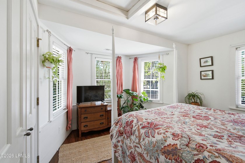 Anchored by a magnificent 400 year old live oak at the front of - photo 34