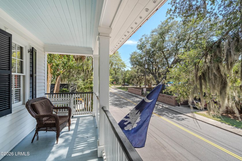 Anchored by a magnificent 400 year old live oak at the front of - photo 36