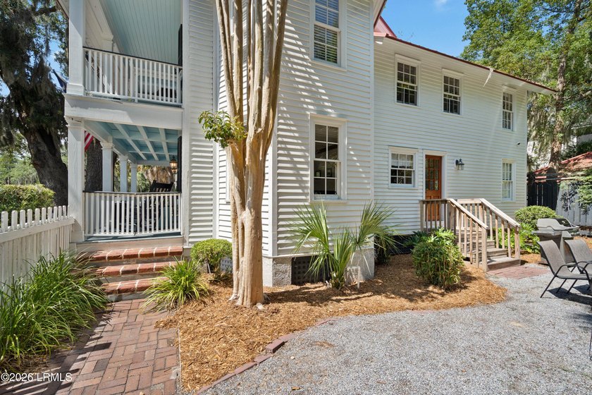Anchored by a magnificent 400 year old live oak at the front of - photo 37