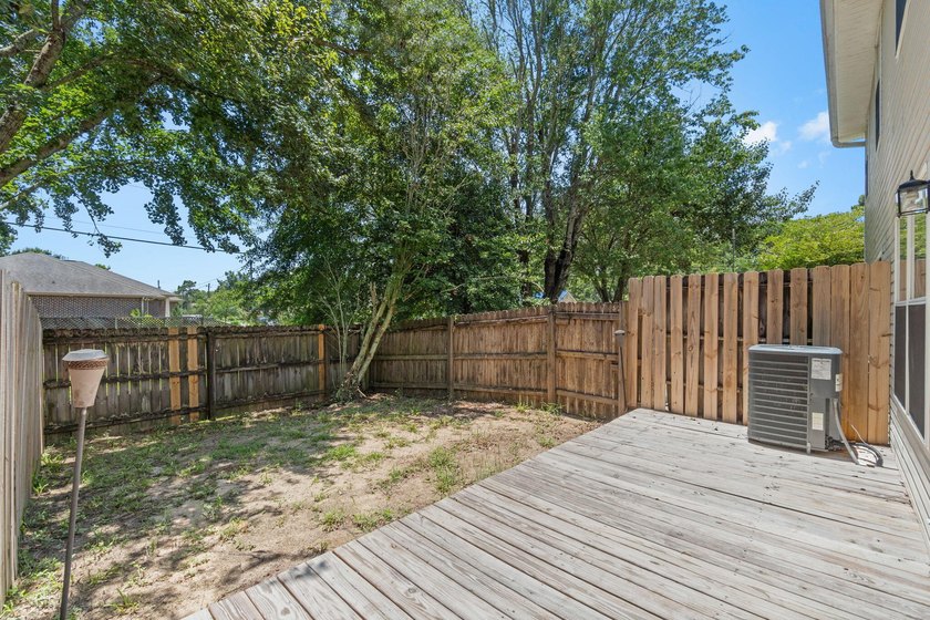 Move-in ready and ideally located, this beautifully maintained - photo 36