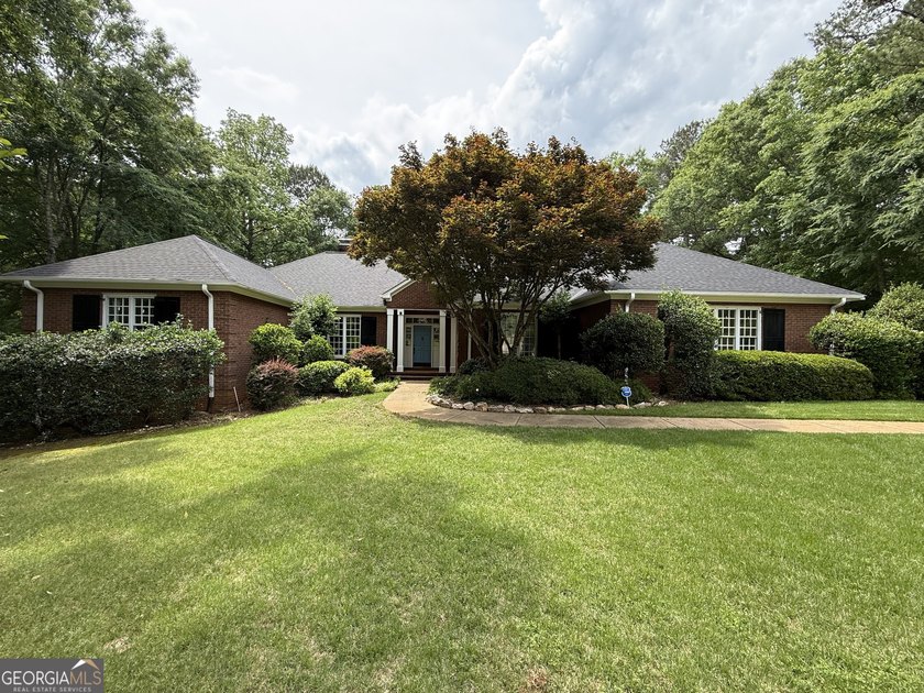 Lakeside Living at Its Finest! This captivating custom-built - photo 3