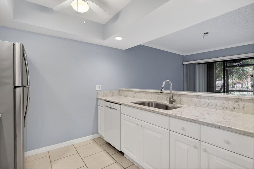 Beautiful first-floor corner unit in the resort-style community - photo 9