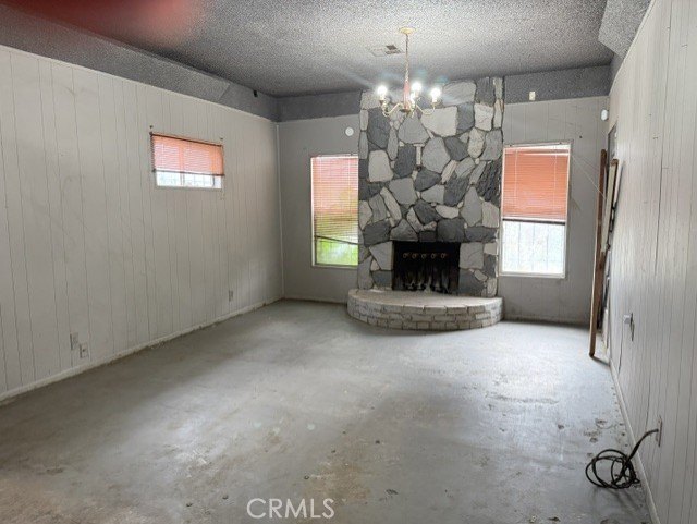Walk into a open space living room with plenty of natural light - photo 13