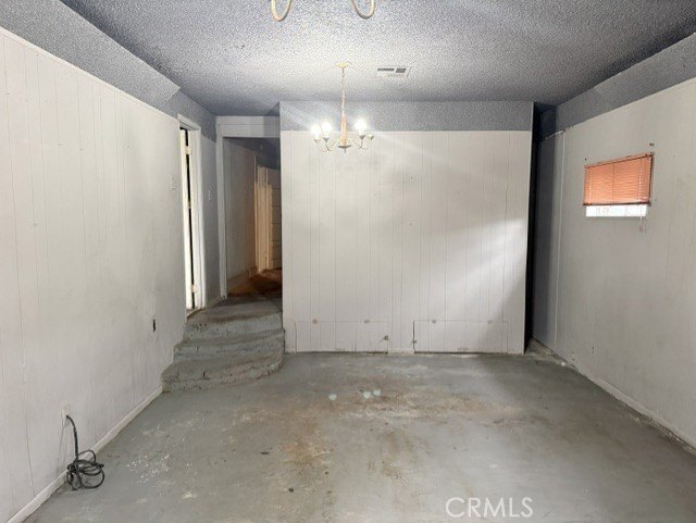 Walk into a open space living room with plenty of natural light - photo 15