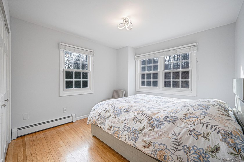 Set within the serene landscape of Rolling Woods in Riverhead - photo 35