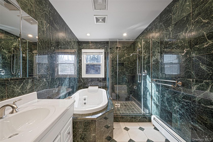 Set within the serene landscape of Rolling Woods in Riverhead - photo 36