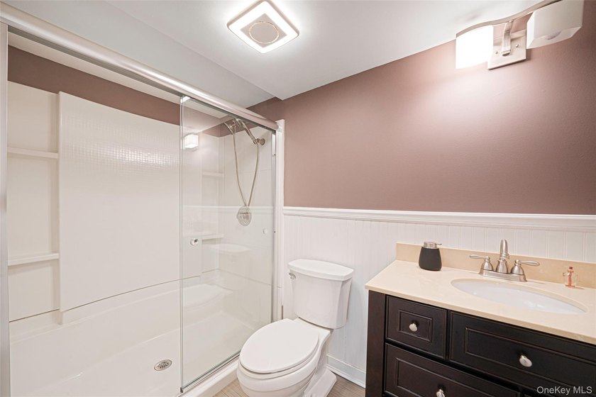 Set within the serene landscape of Rolling Woods in Riverhead - photo 43