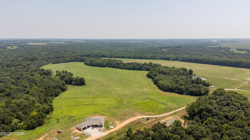 Discover an extraordinary opportunity to own 296+/- acres of - photo 3