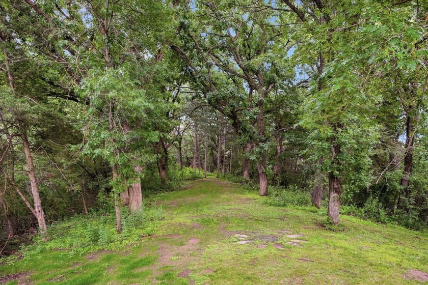 Escape to your own private retreat on 7.84 breathtaking wooded - photo 49
