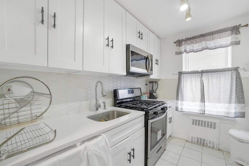 Step into this fully renovated and well-maintained 2-bedroom - photo 11
