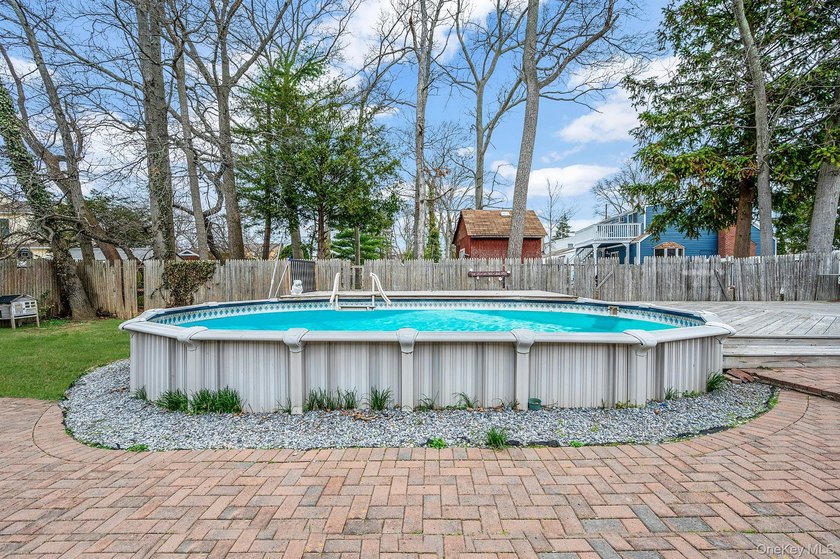 Beautiful ranch home style perfect for enjoying the summer this - photo 12