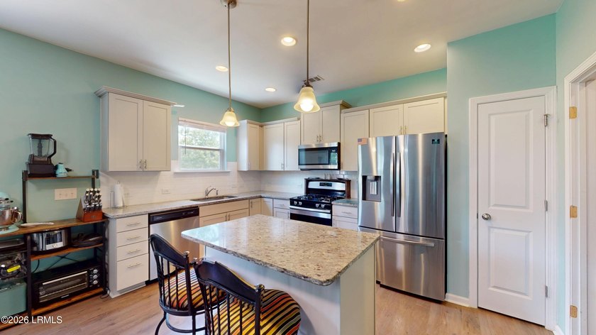 Thoughtfully upgraded throughout, this 4 bedroom, 2.5 bath - photo 15