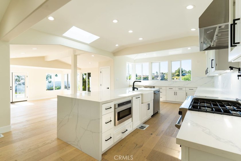 This newly renovated home with breathtaking 180-degree ocean - photo 13