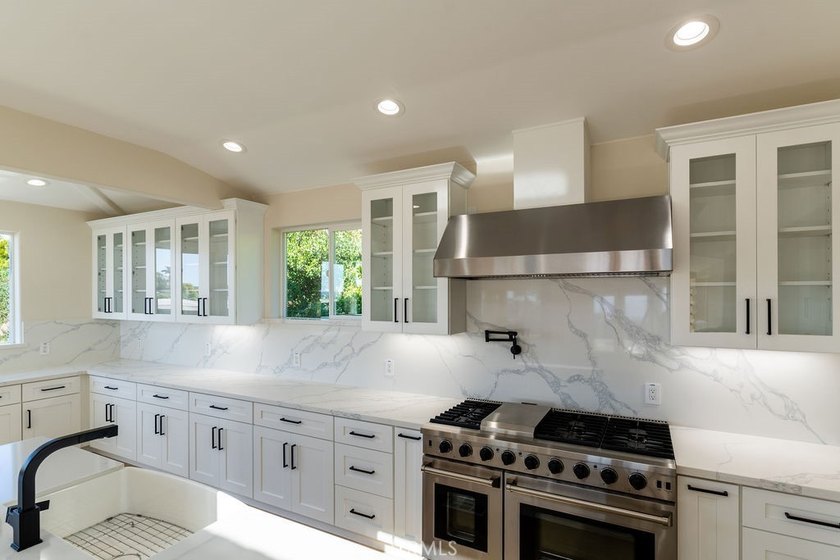 This newly renovated home with breathtaking 180-degree ocean - photo 17