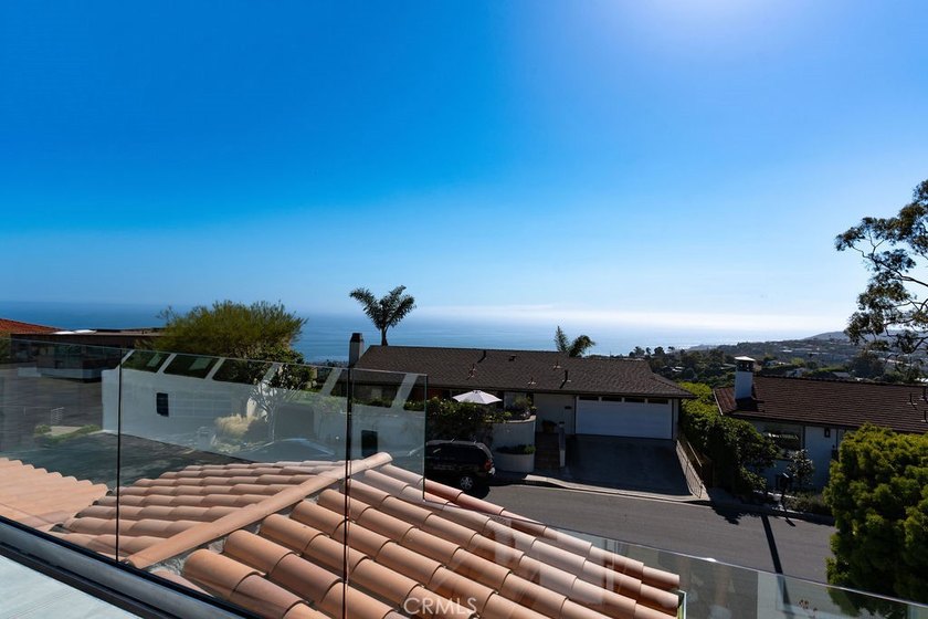 This newly renovated home with breathtaking 180-degree ocean - photo 32