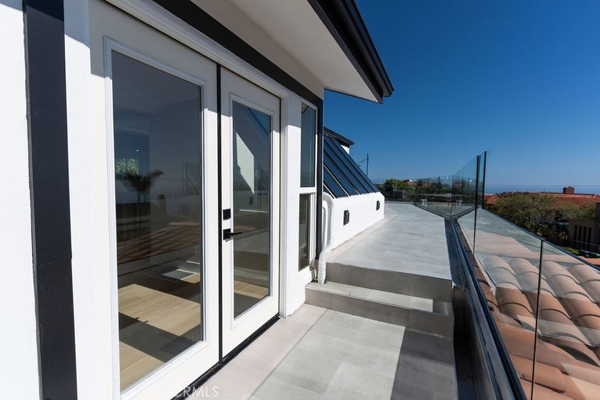 This newly renovated home with breathtaking 180-degree ocean - photo 34