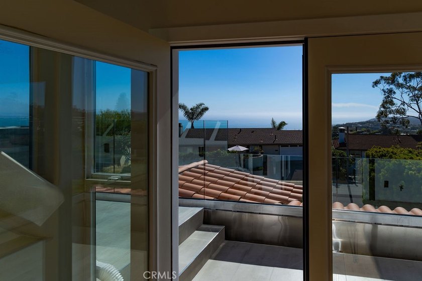 This newly renovated home with breathtaking 180-degree ocean - photo 35
