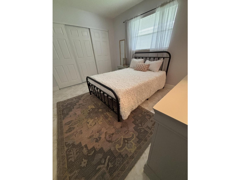 Move right in to this charming THREE bedroom condominium, in the - photo 10